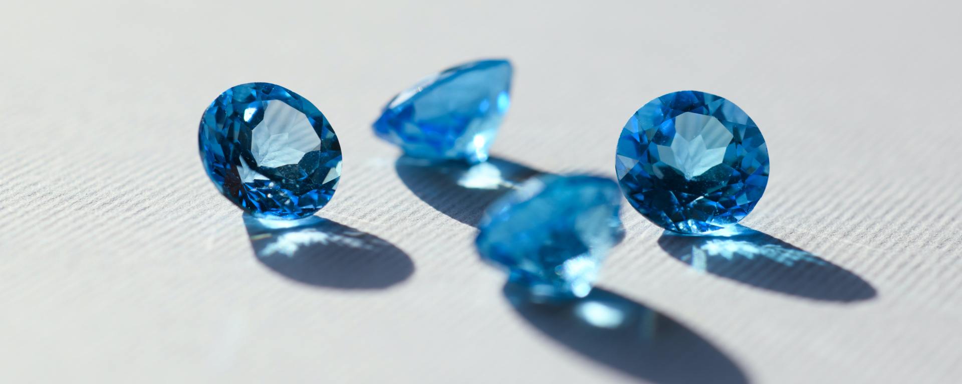 4 free blue topaz gemstones