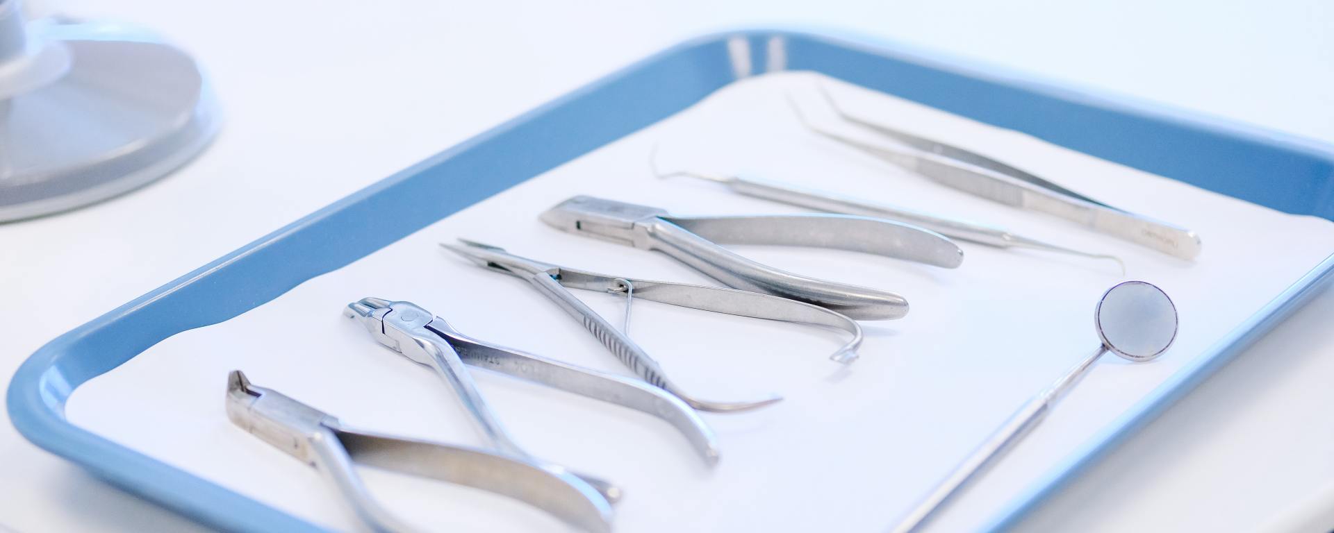 dental instruments on a plastic tray
