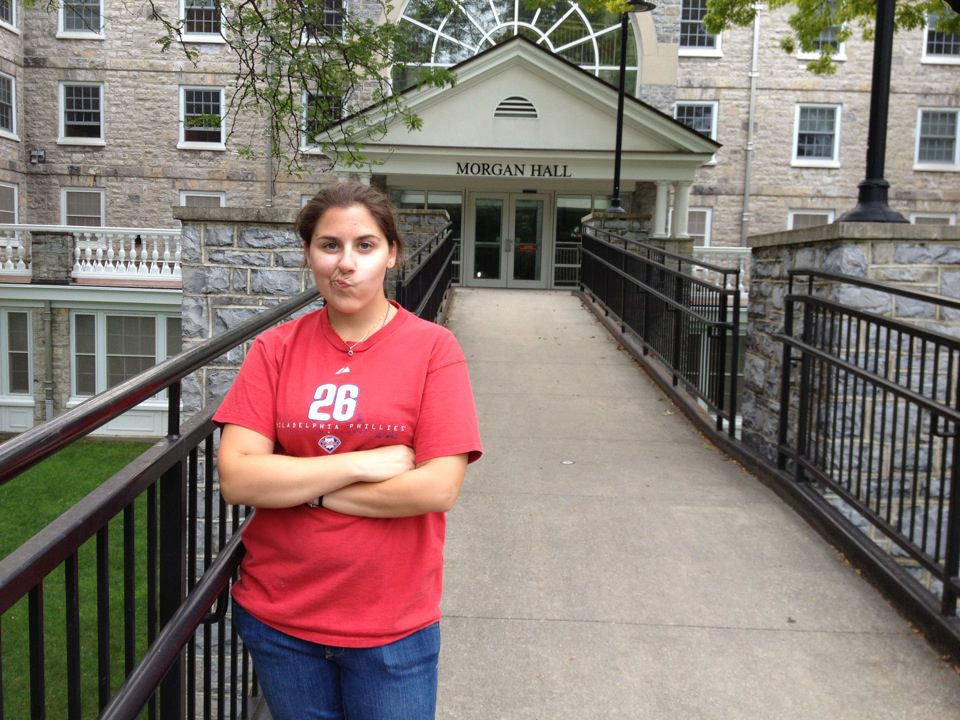 renata making an annoyed face in front of morgan hall at dickinson college